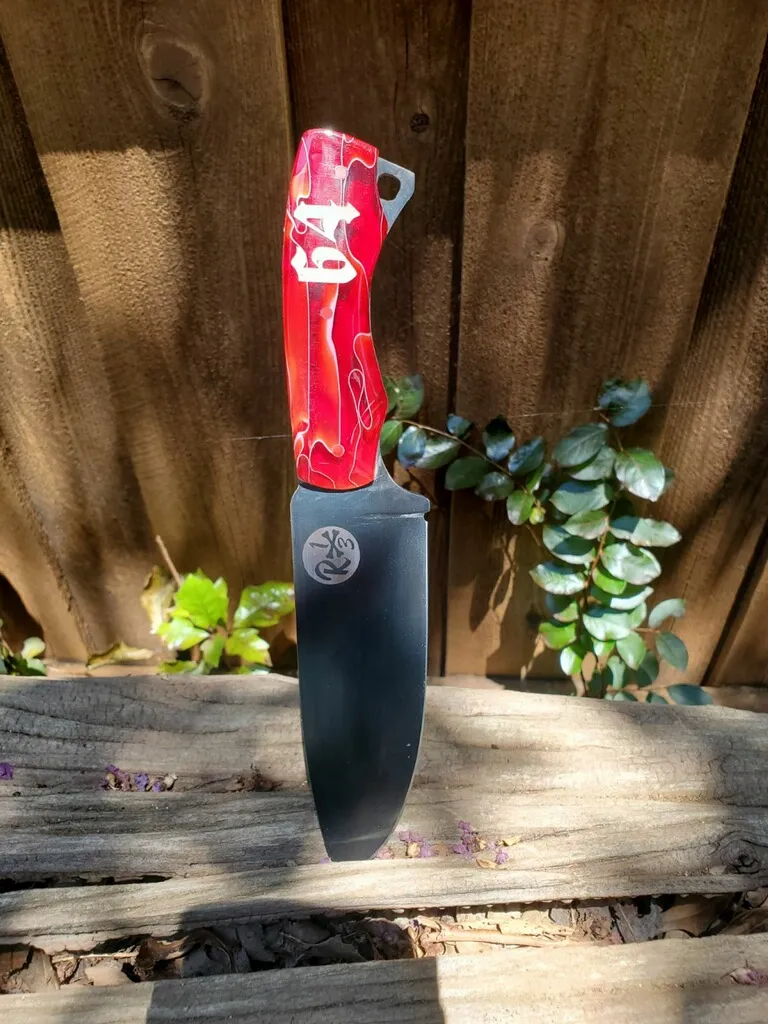 a knife made by R13 Knifeworks